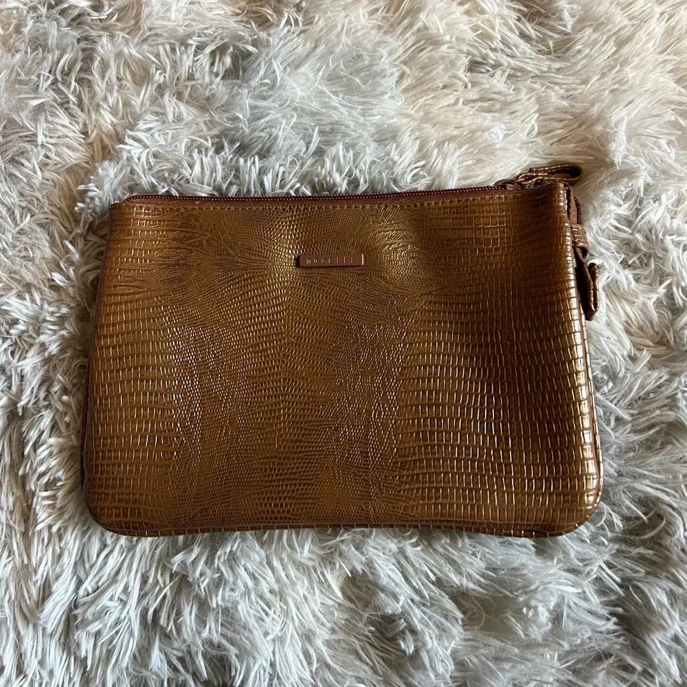 Like new modella brown makeup or storage pouch